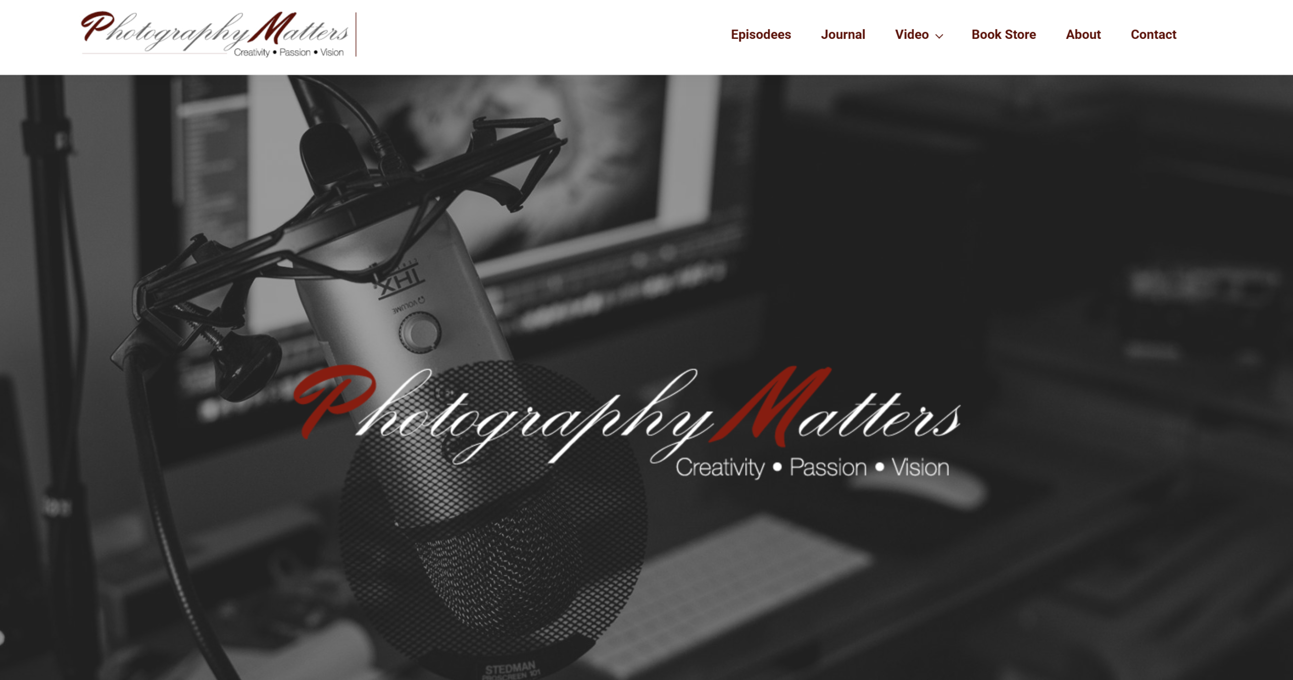 A close-up of a microphone in a recording setup, with Photography Matters logo and website menu at the top.