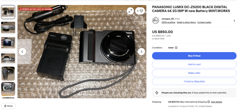 Panasonic Lumix DC-ZS200 camera, charger, and cables on bubble wrap, listed for sale online for $850.